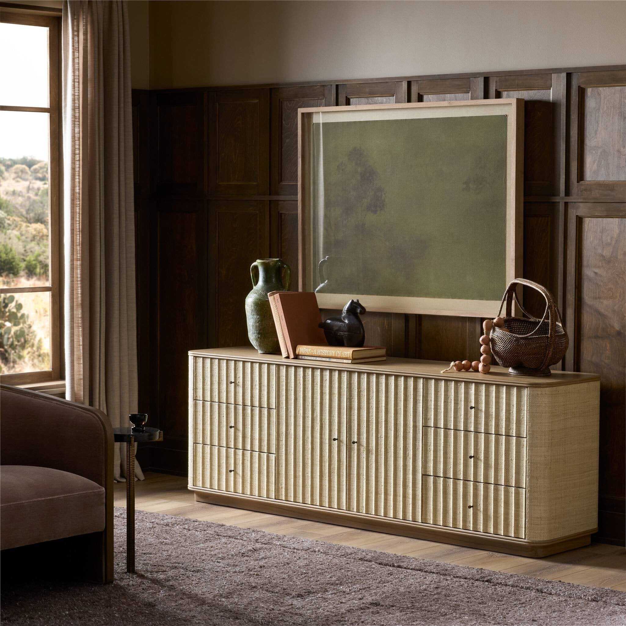 Four Hands Meyer Natural Fleck Raffia Media Console - styled room setting