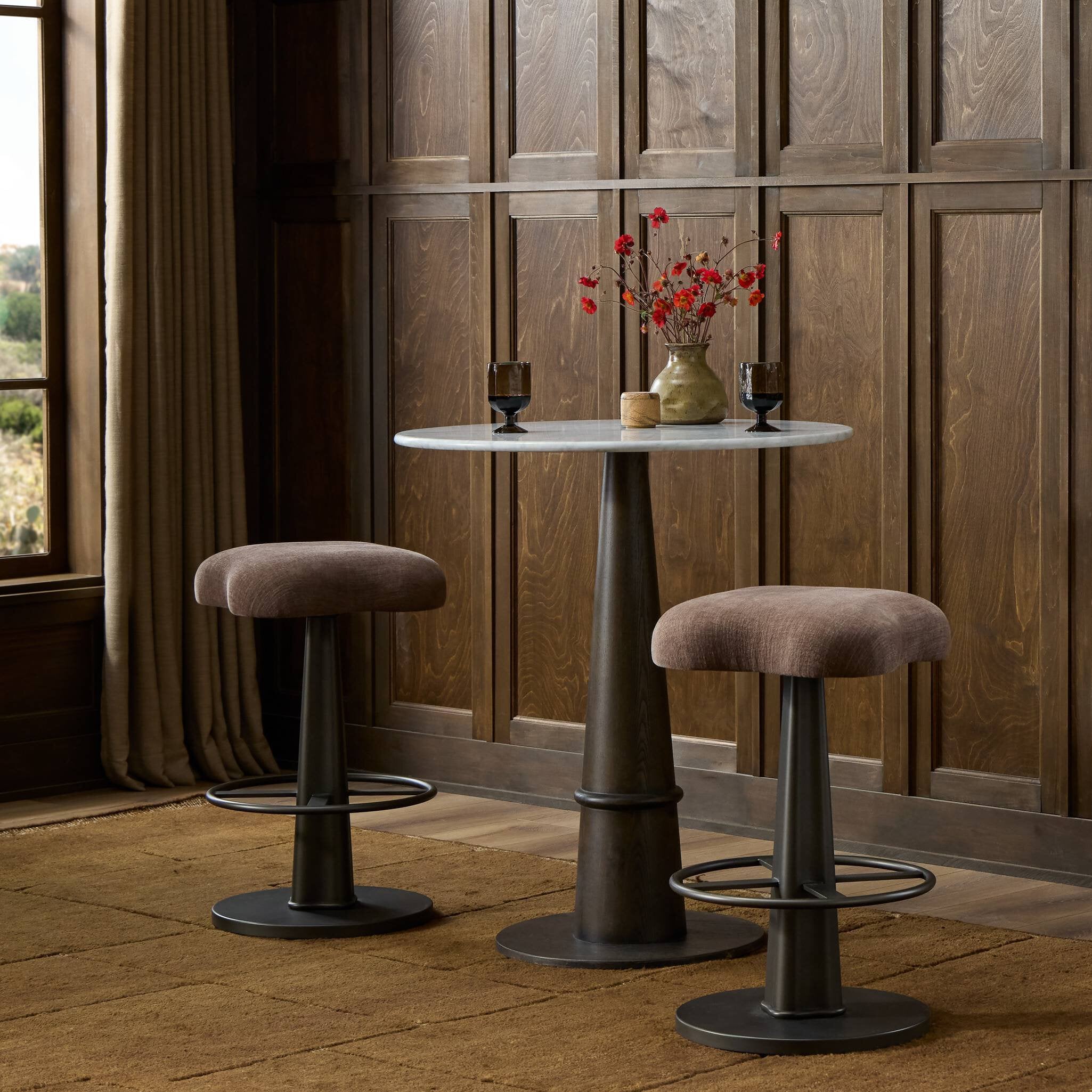 Four Hands Clova Laughlin Cafe Swivel Counter Stool styled in a room setting