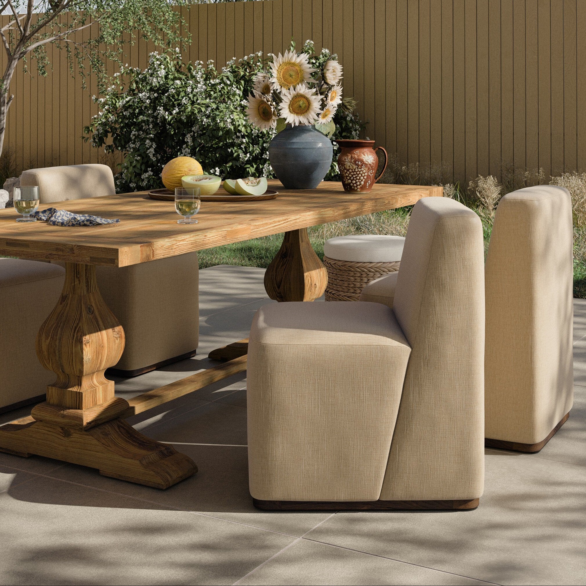 Four Hands Almere Vergo Camel Outdoor Dining Chair styled in a room setting