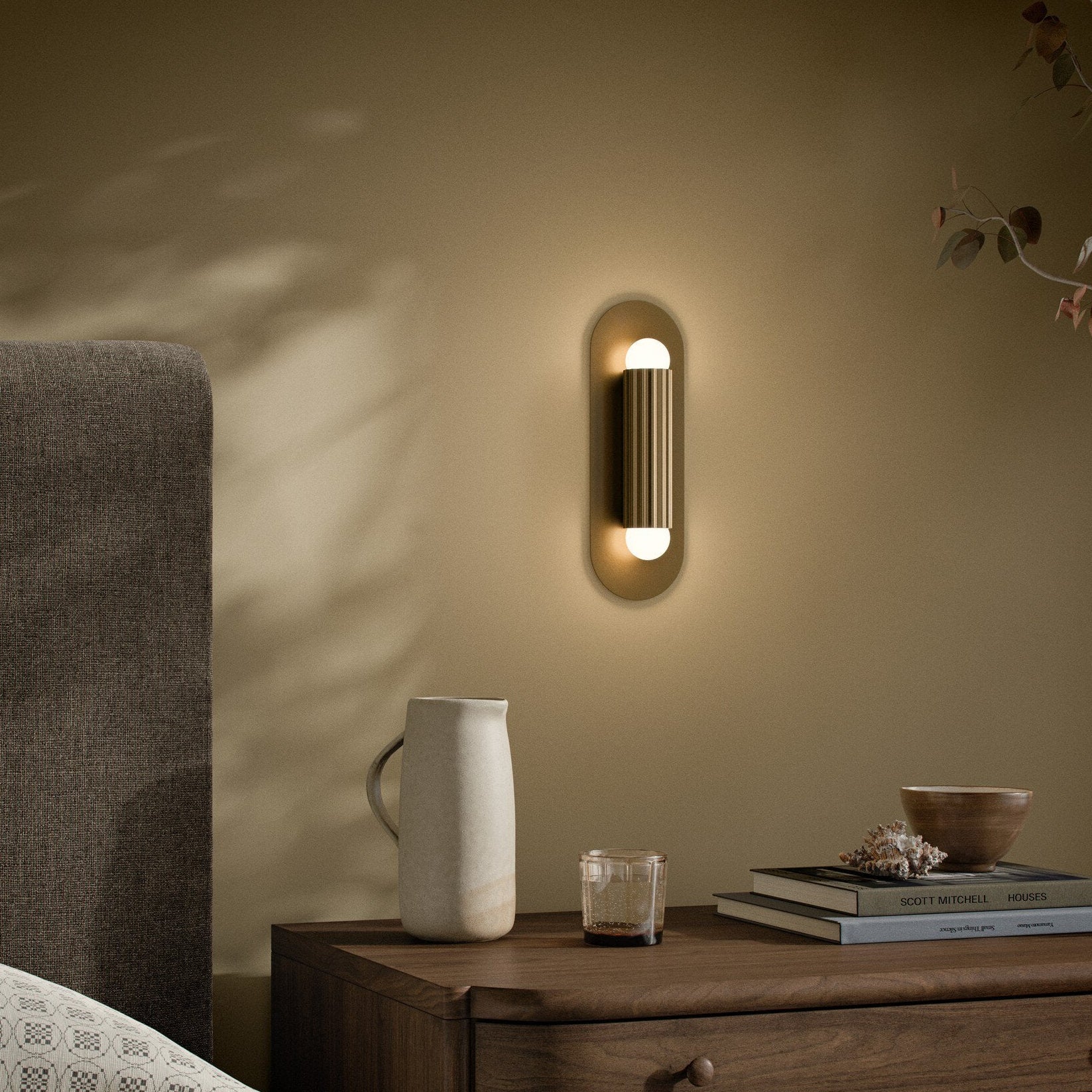 Four Hands Vesta Burnished Brass Wall Sconce styled room setting