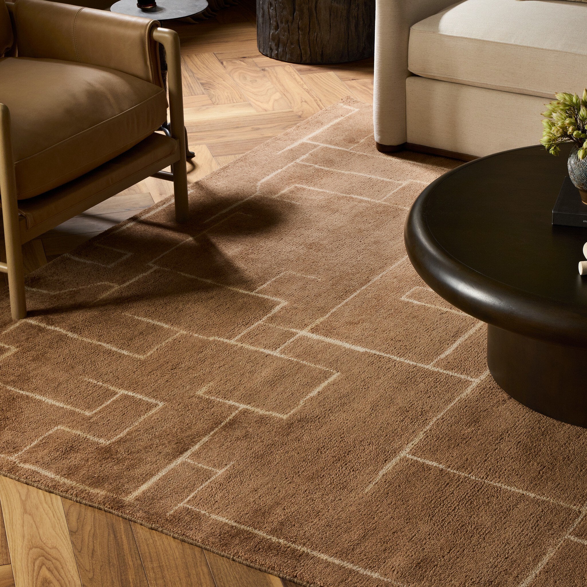 Four Hands Milano Milano Saddle Hand-Knotted Rug styled in a room setting