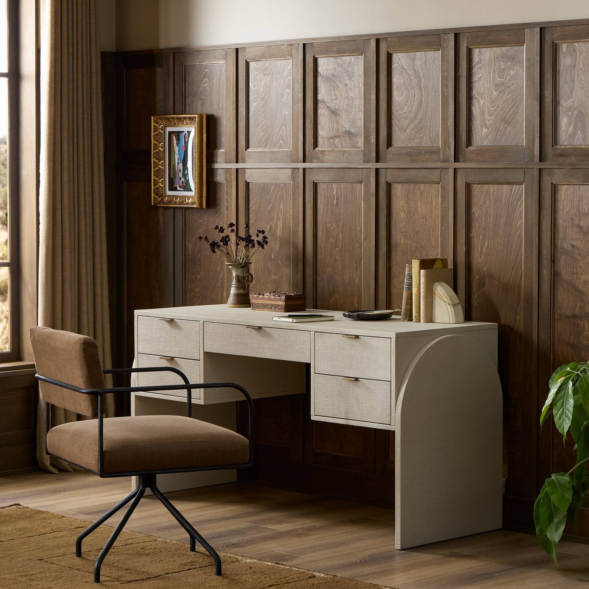 Four Hands Cressida Ivory Painted Linen Desk styled in a room setting