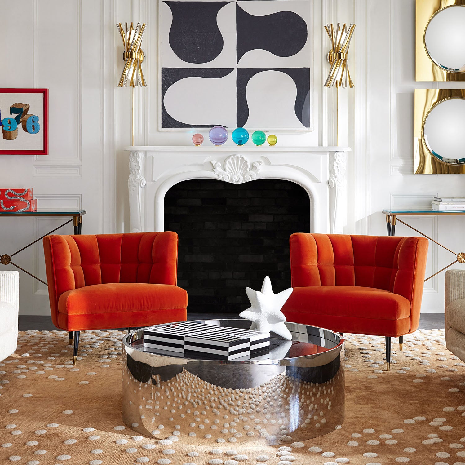 Side profile of Jonathan Adler Acrylic Orb Set of five jewel-tone acrylic orbs on brass stands