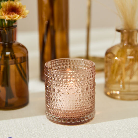 Share Votive Candle Holder Set of 4, a light pink glass home decor accent