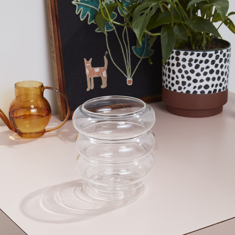 Stacked Rings Glass Pot with Saucer displayed in an interior setting