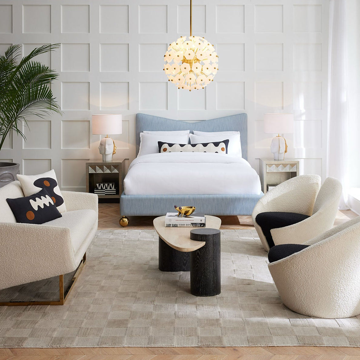 Jonathan Adler Oeuf Travertine cocktail table shown to scale in a room