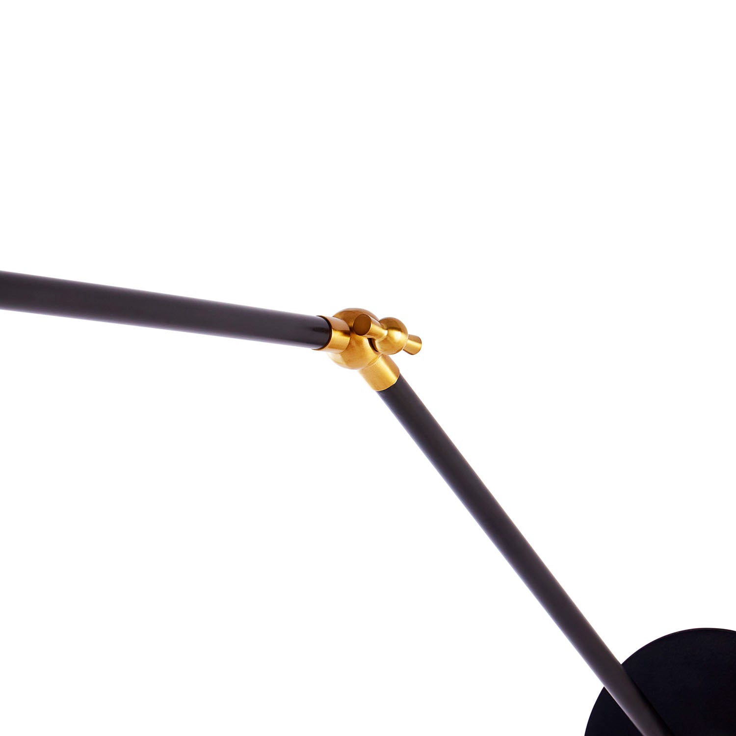 Jonathan Adler The Ripple articulating wall sconce with orange shade and brass cuff styled in a room
