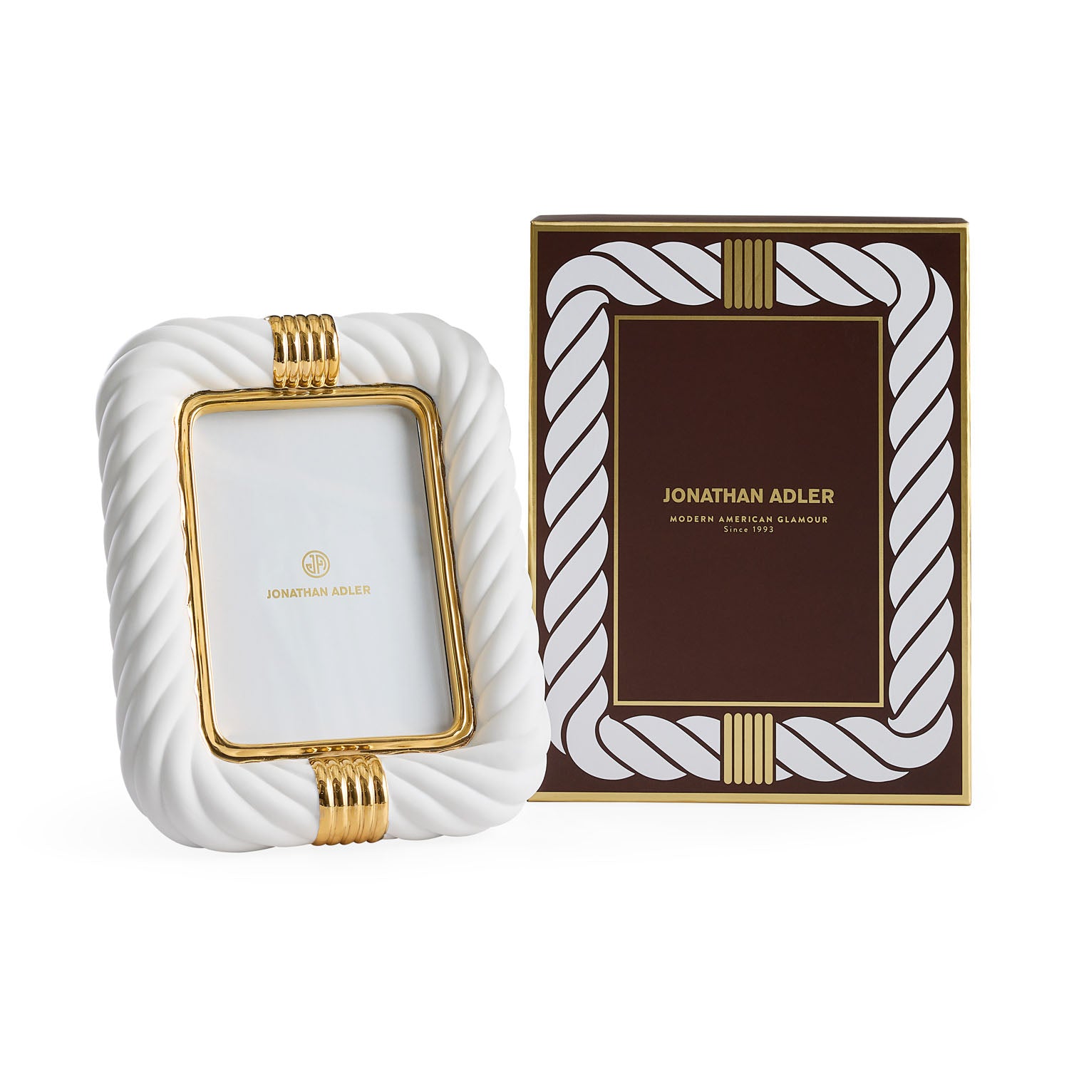 Jonathan Adler Geneva porcelain frame styled on a shelf