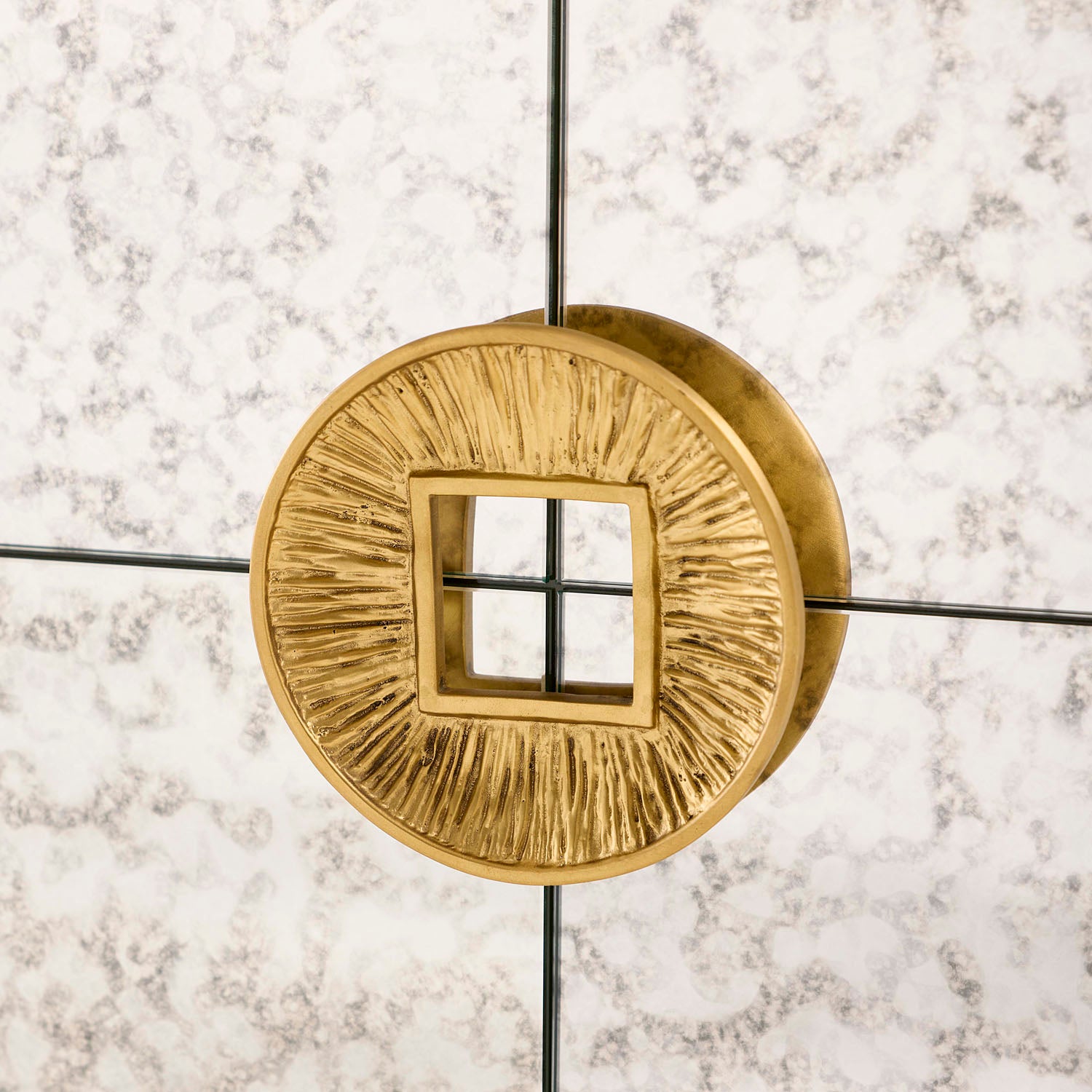 Jonathan Adler Baldwin Credenza in antiqued mirror and olive lacquer with brass shown from a low angle
