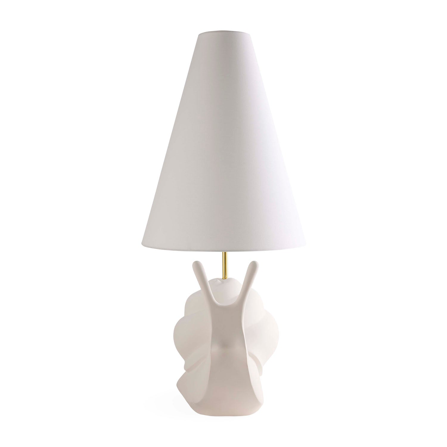 Jonathan Adler Giant Snail lamp illuminated on an end table