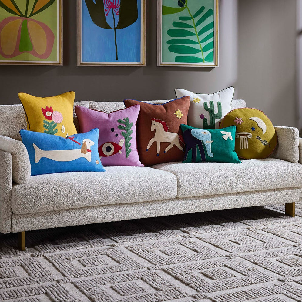 Jonathan Adler Close-up of the corded embroidery and grosgrain flange, Playa Celestial Throw Pillow