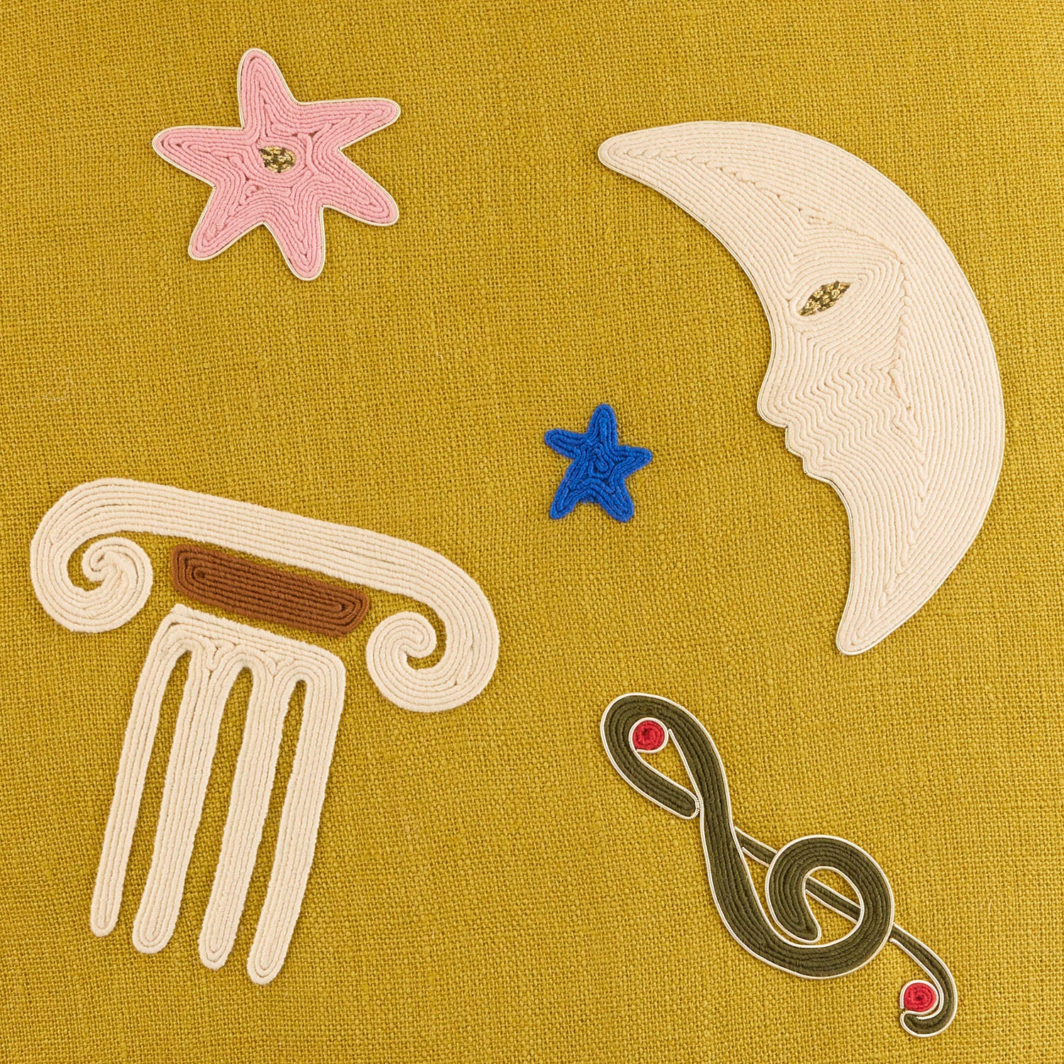 Jonathan Adler The Playa Celestial throw pillow in gold-embroidered dyed linen shown to scale