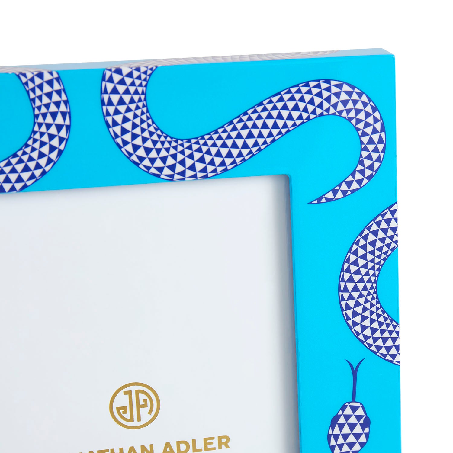 Close-up of the signature serpent motif