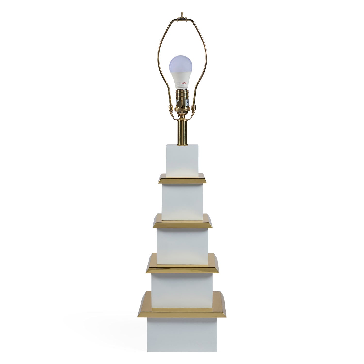 Jonathan Adler Pagoda ivory lamp shown to scale on a side table