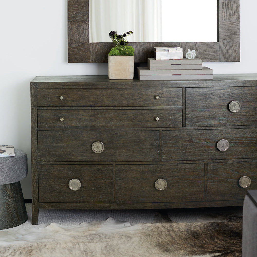 Bernhardt Linea Cerused Charcoal Round Bench in Cerused Charcoal finish, styled in a room.
