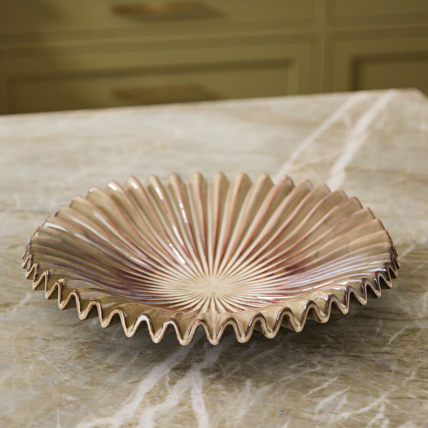 Syllable Bowl shown as a styled home décor accent