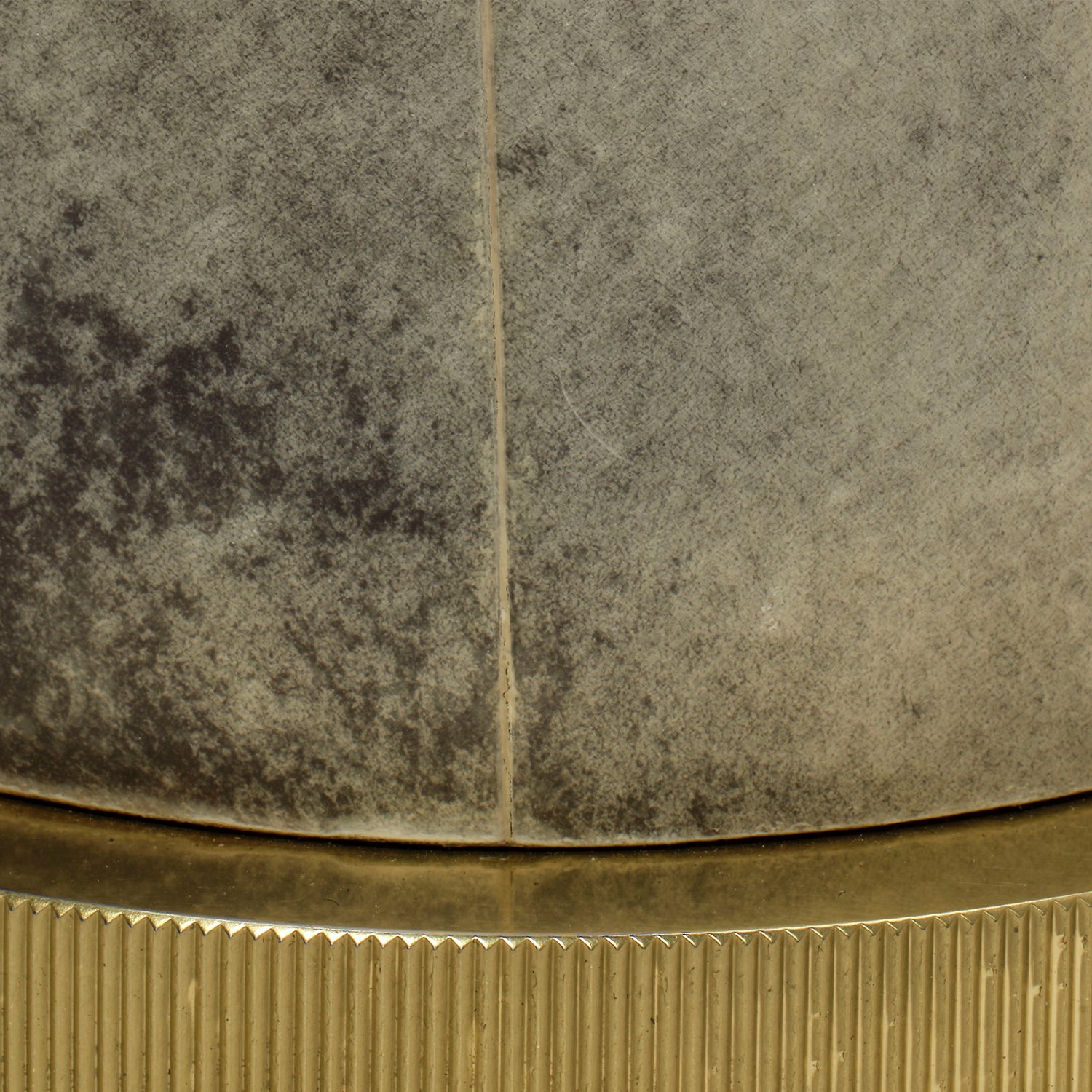 Jamie Young Rivet vellum table lamp styled beside an armchair