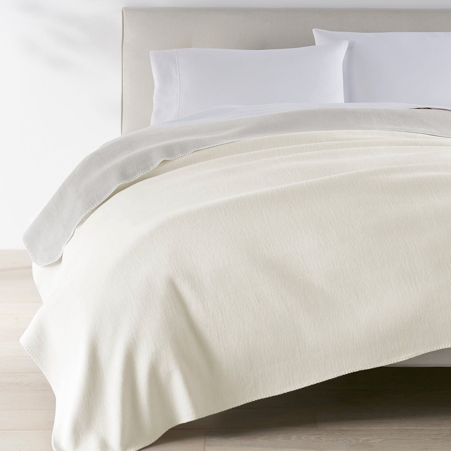 Peacock Alley Alta reversible cotton-blend throw blanket stack of neatly folded linens