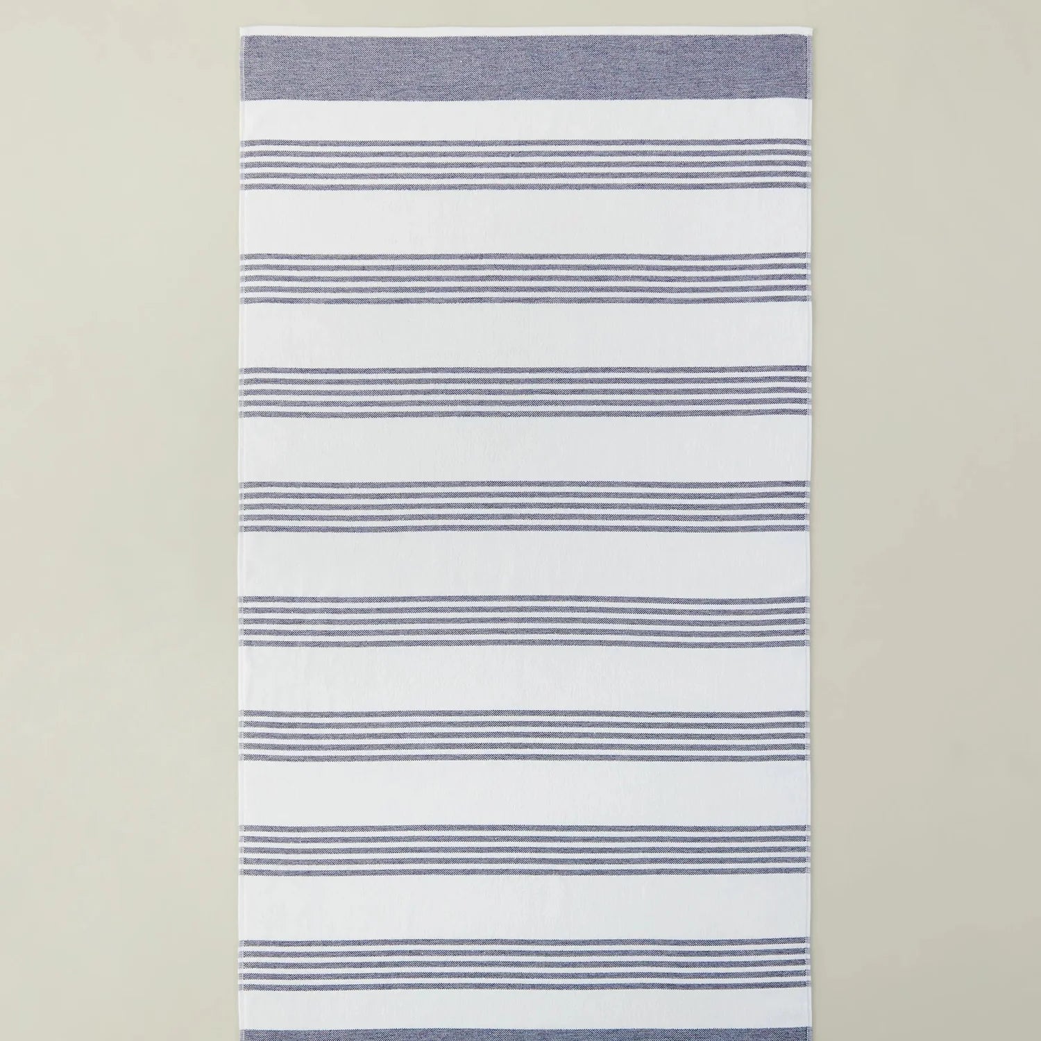Peacock Alley Aegean Stripe Beach Towel Turkish cotton, shown in the navy colorway