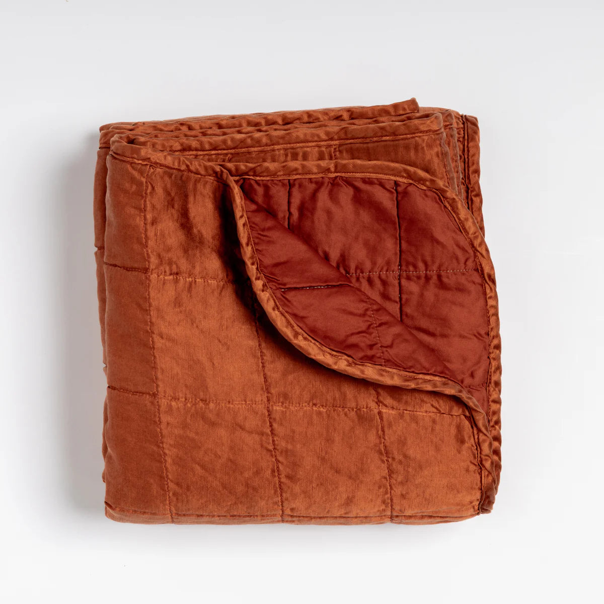 Bella Notte Sel Throw Blanket in quilted charmeuse, shown in a deeper, richer colorway