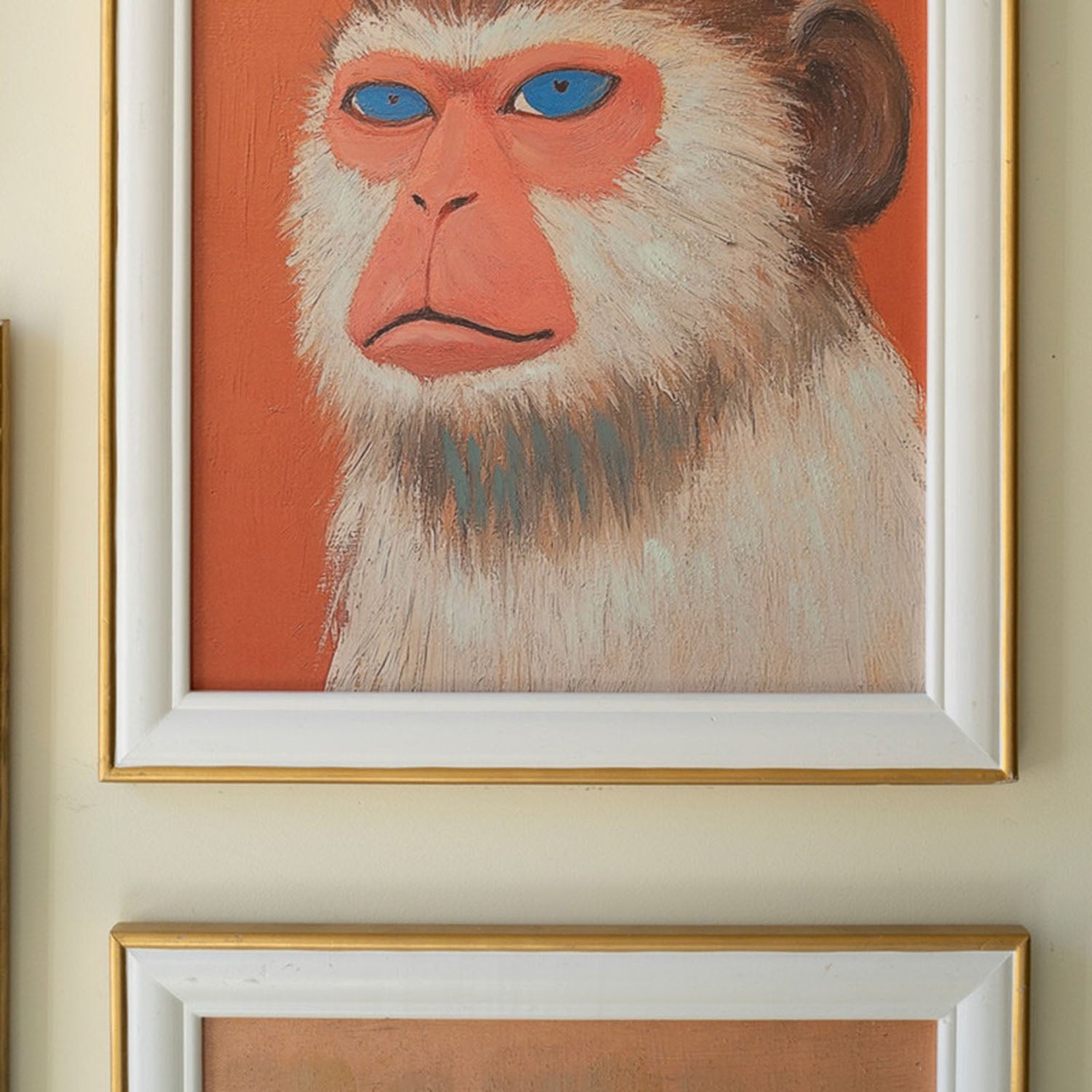 Animal print framed artworks styled on a wall to show scale
