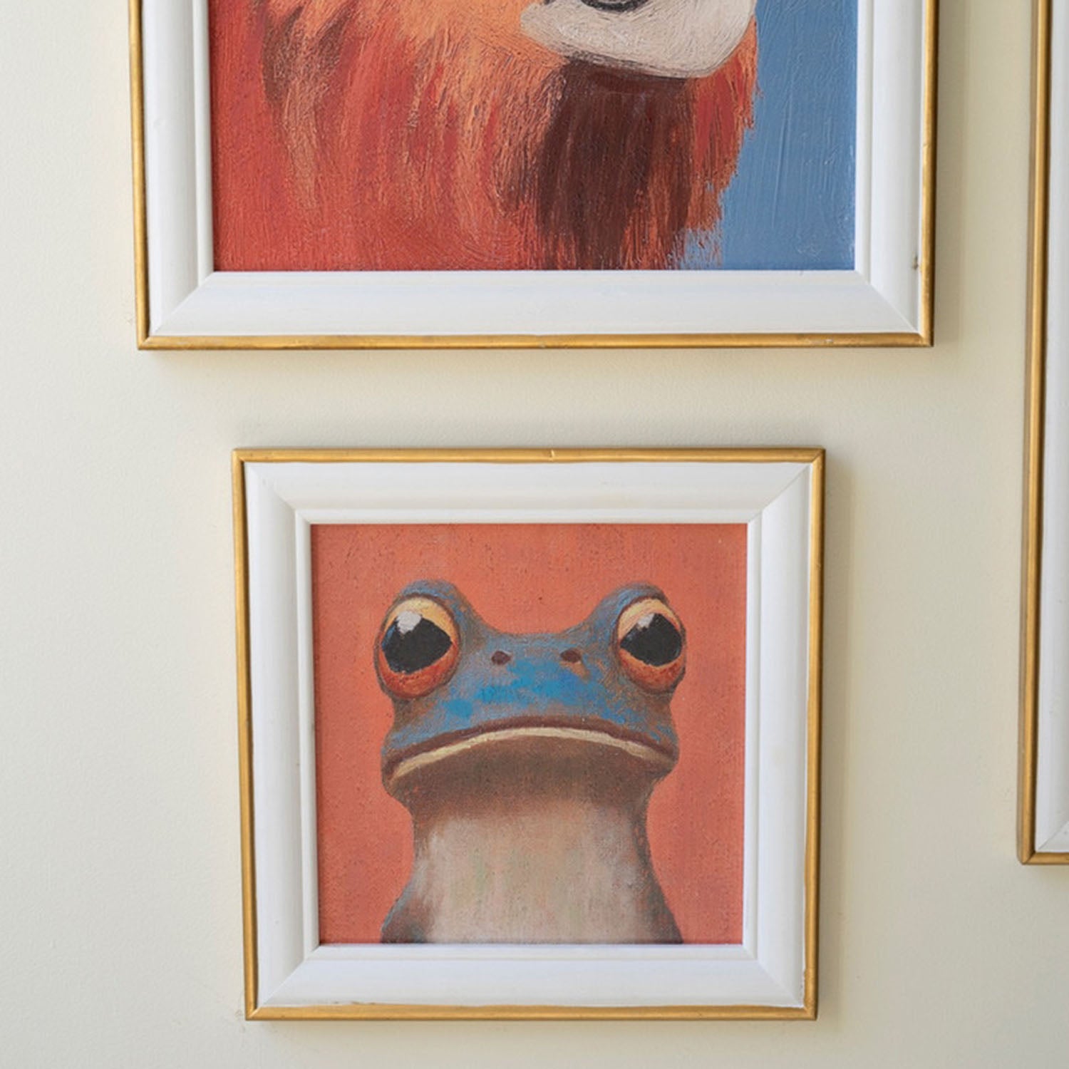 Bird framed animal portrait in a natural wood frame, front view