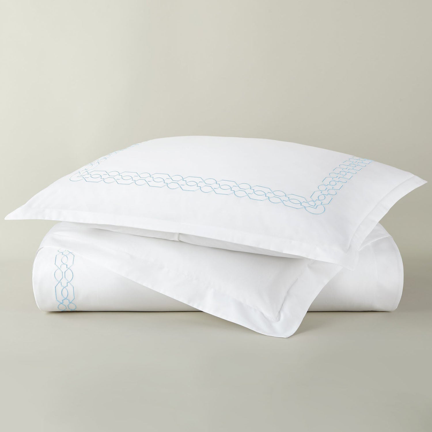 Peacock Alley Filigree embroidered cotton percale duvet set shown in a lighter colorway