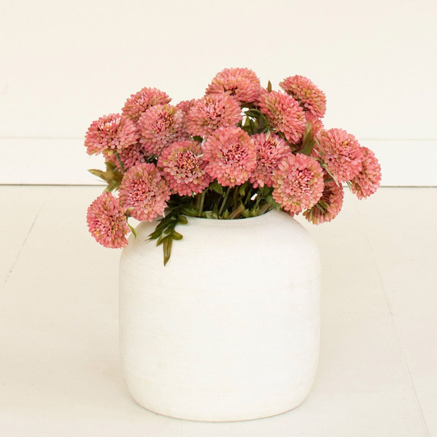 Faux dahlias grouped to show the fullness of the set