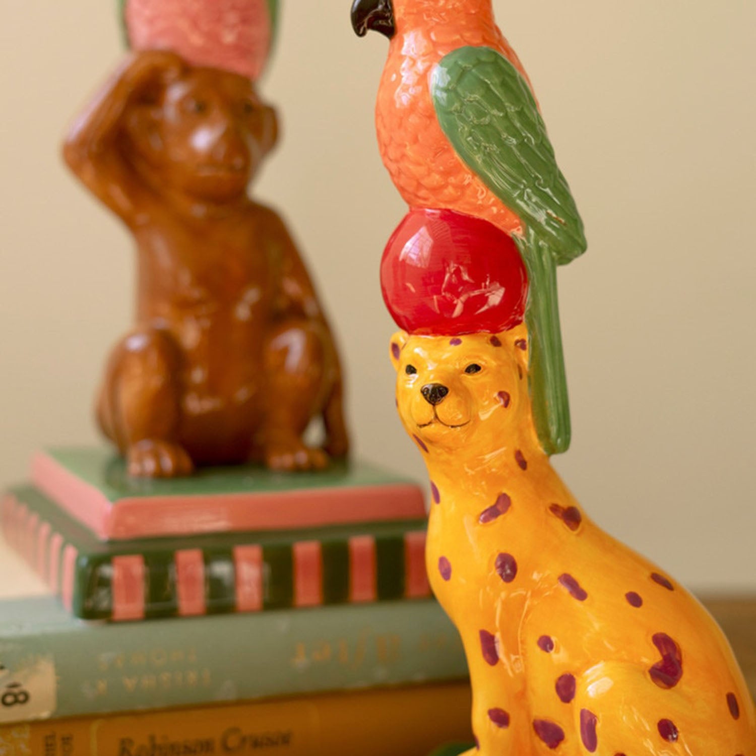 Three-quarter angle of the ceramic monkey taper candle holder