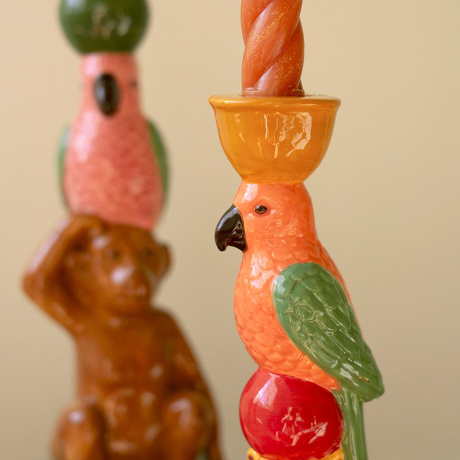 Close-up of the vintage-inspired painted detail on the ceramic cheetah holder
