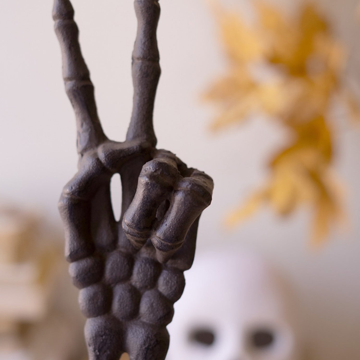 Cast Iron Skeleton Peace Arm