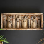 Carved Driftwood Figures in a Framed Shadowbox