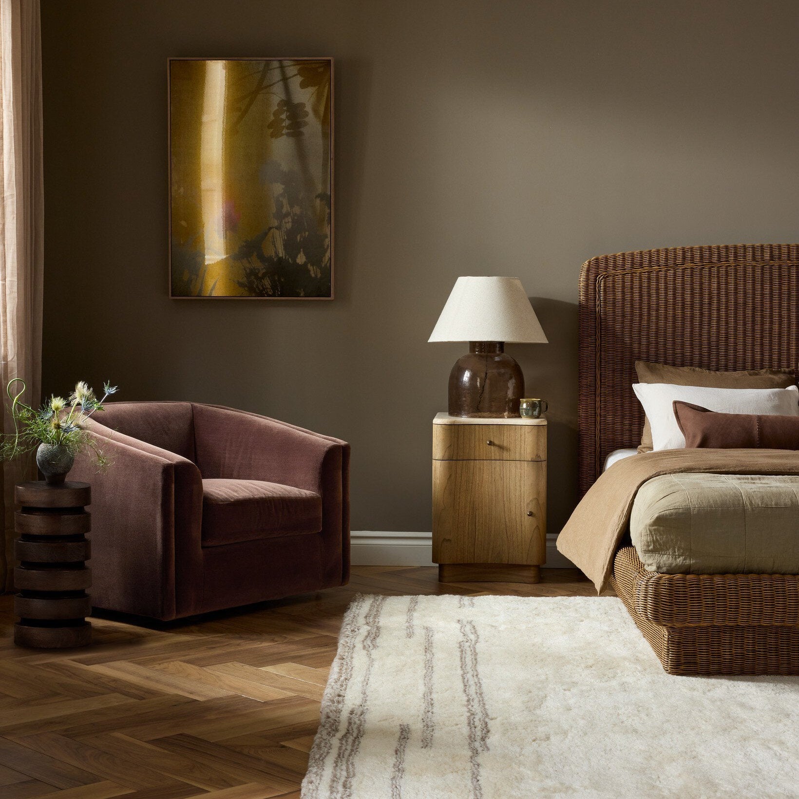 Four Hands Presley Monte Chocolate Swivel Chair styled in a room setting (2)