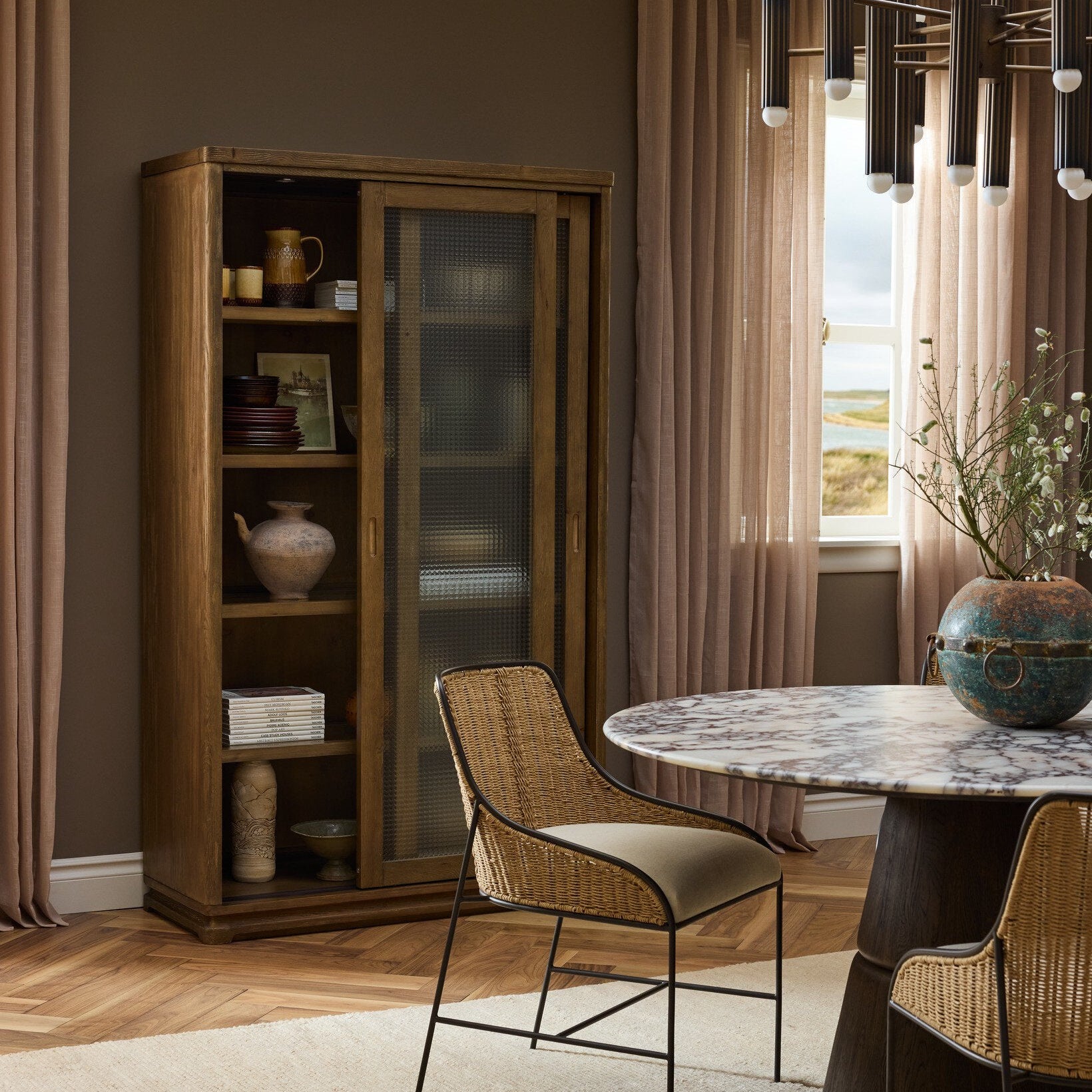 Four Hands Foster Sandy Hemlock Cabinet styled in a room setting (2)