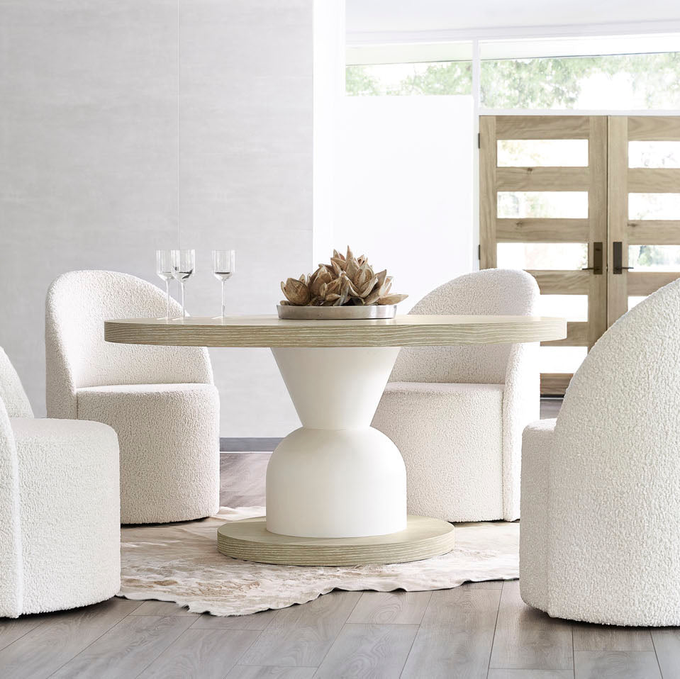Bernhardt Solaria Round Dining Table in Dune finish, styled in a room setting