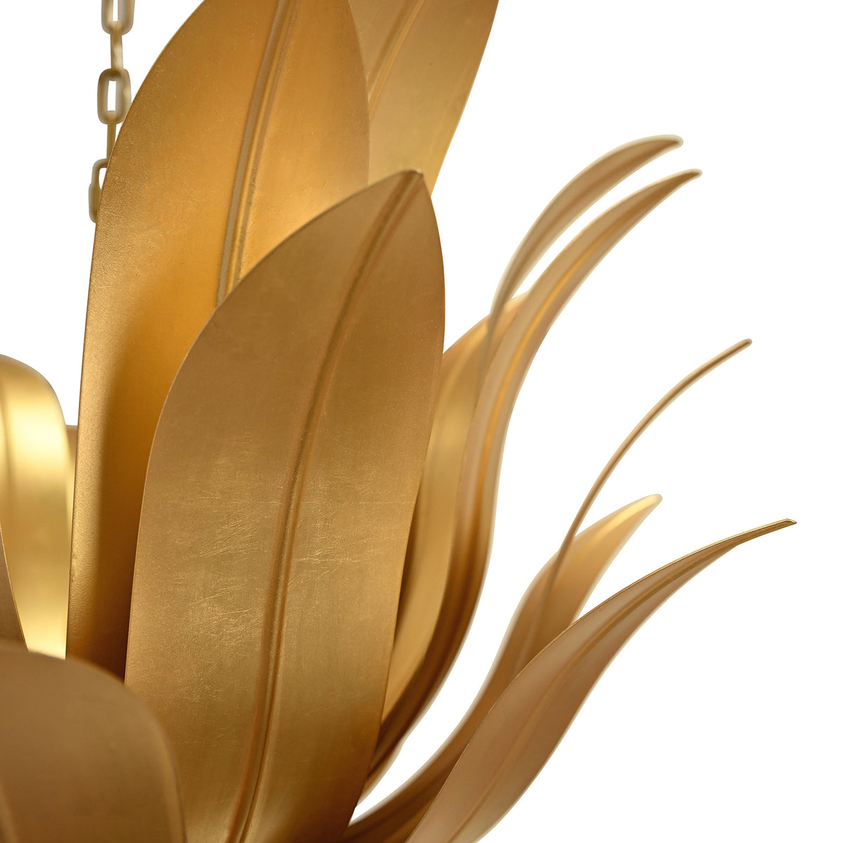 Close-up of the gold leaf metal finish on the Leander Gold Chandelier