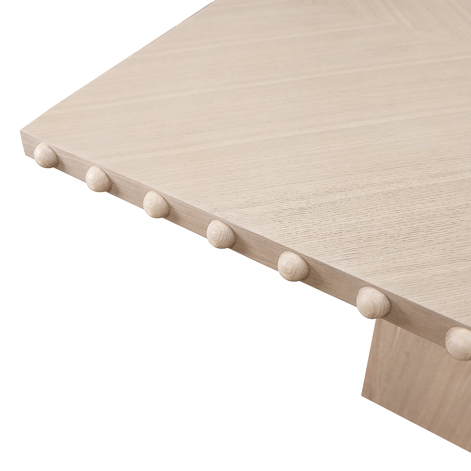 Close-up of the white oak wood finish on the Lucian White Oak Rectangle Dining Table