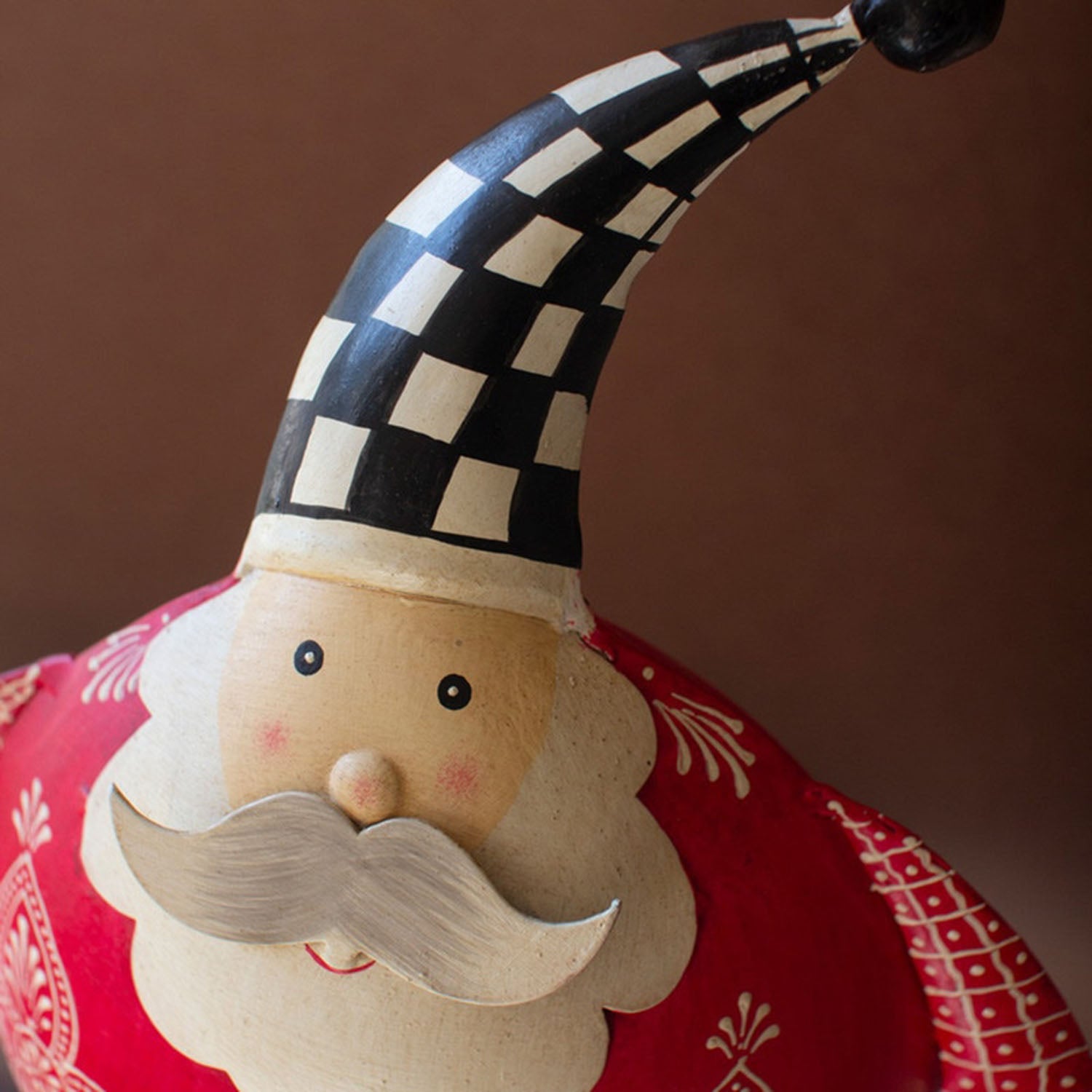 Back view of the checkered Santa showing the painted red finish