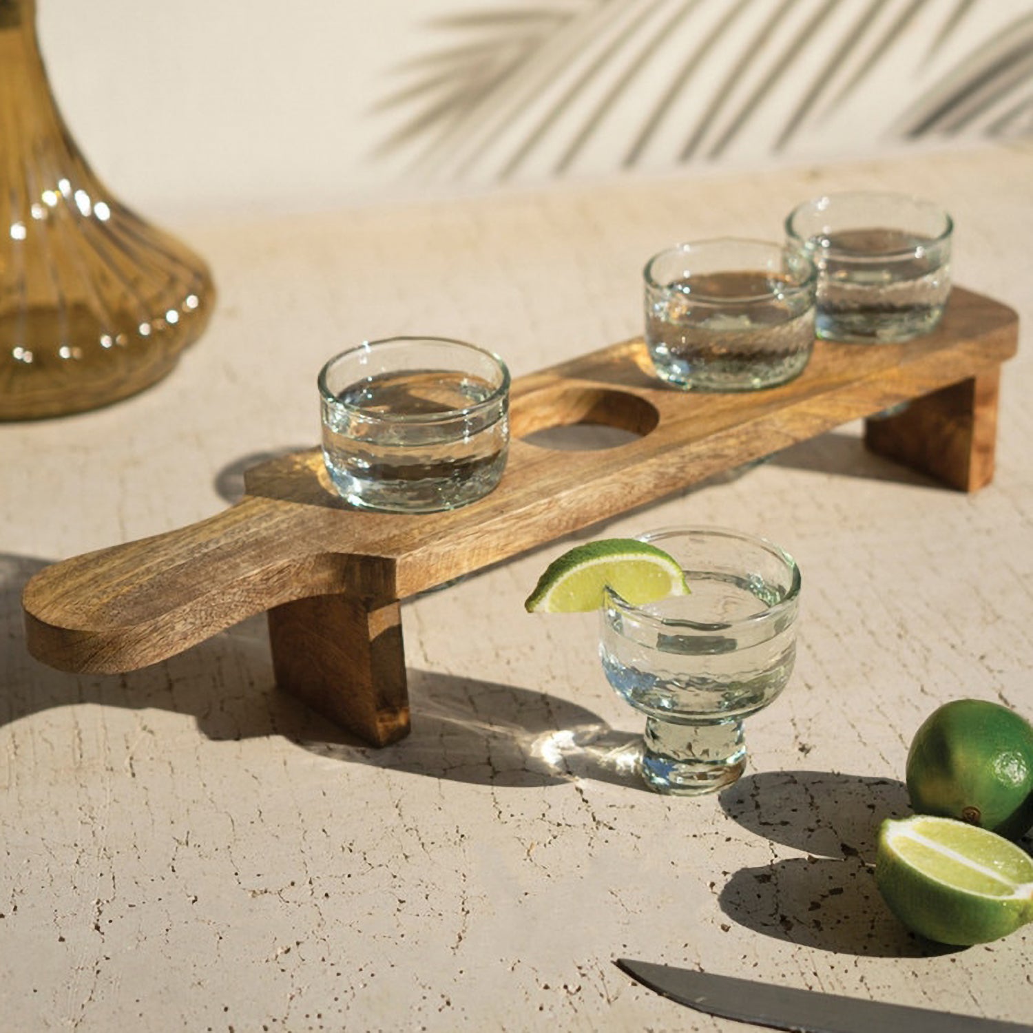 Tequila Flight with Four Glasses on a Wooden Tray