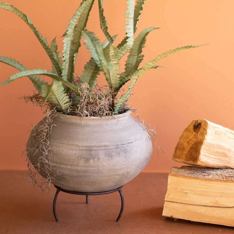 Black Clay Urn on an Iron Stand