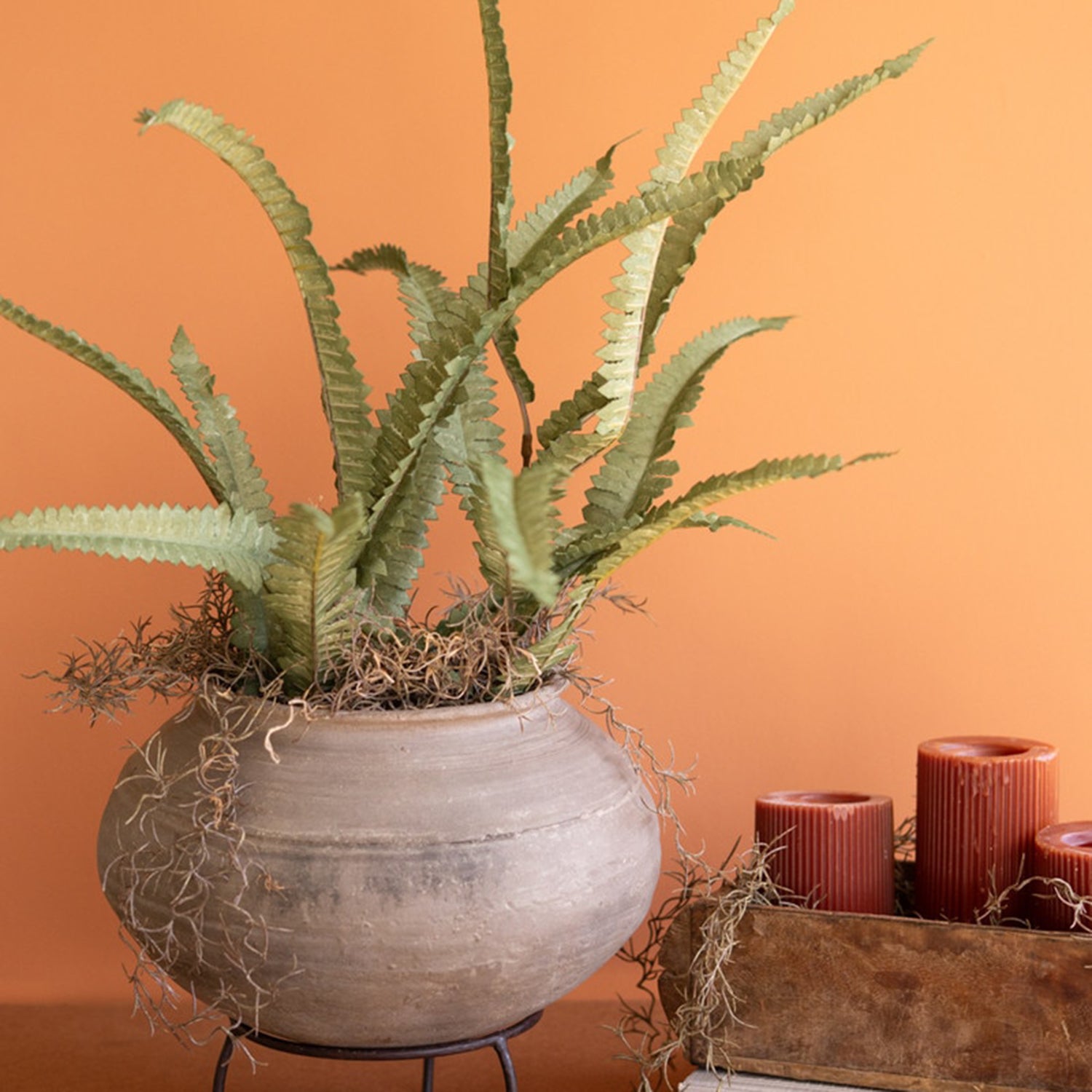Black Clay Urn on an Iron Stand