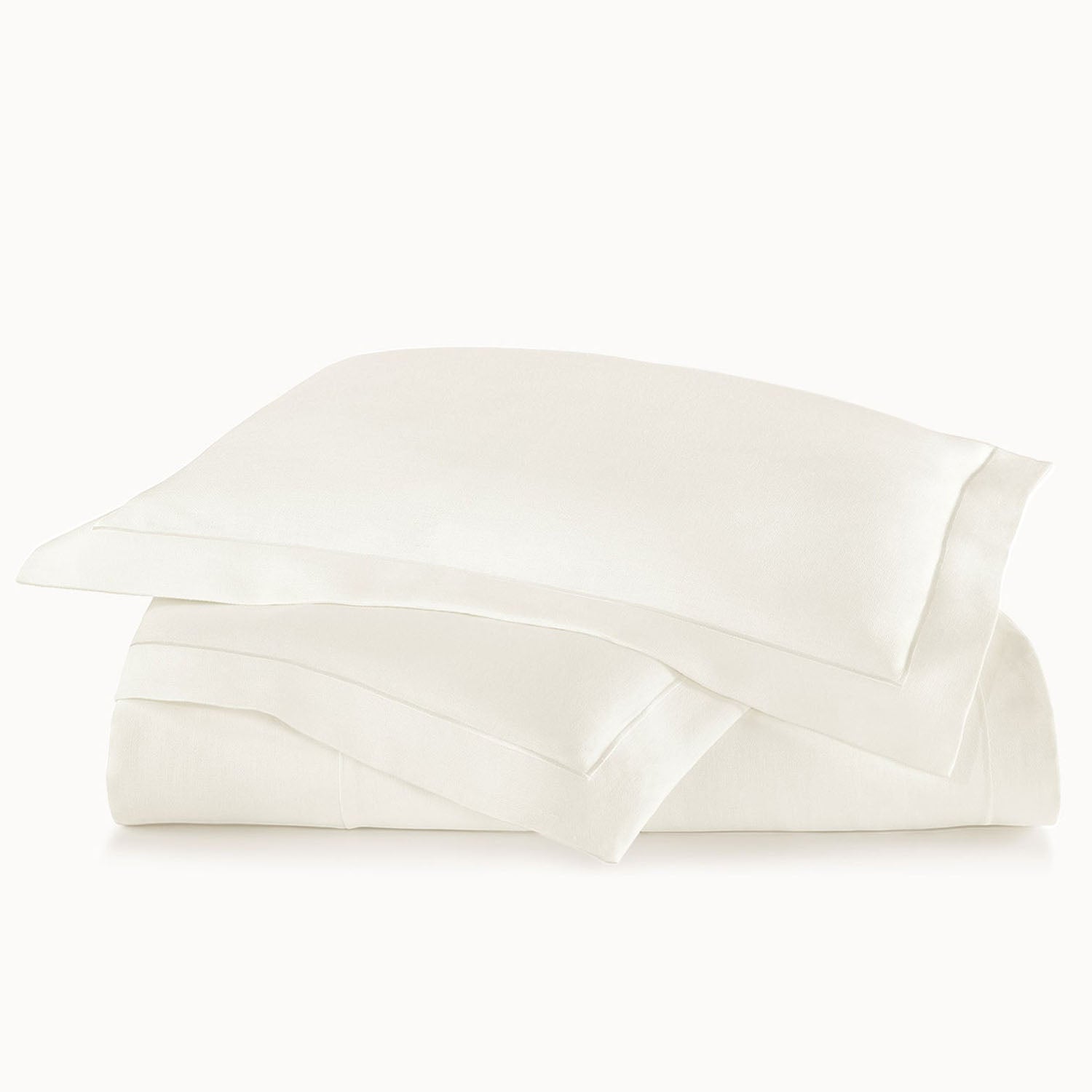 Peacock Alley Rio Satin Stitch Coverlet 100% linen satin stitch coverlet, draped and layered detail on the bed