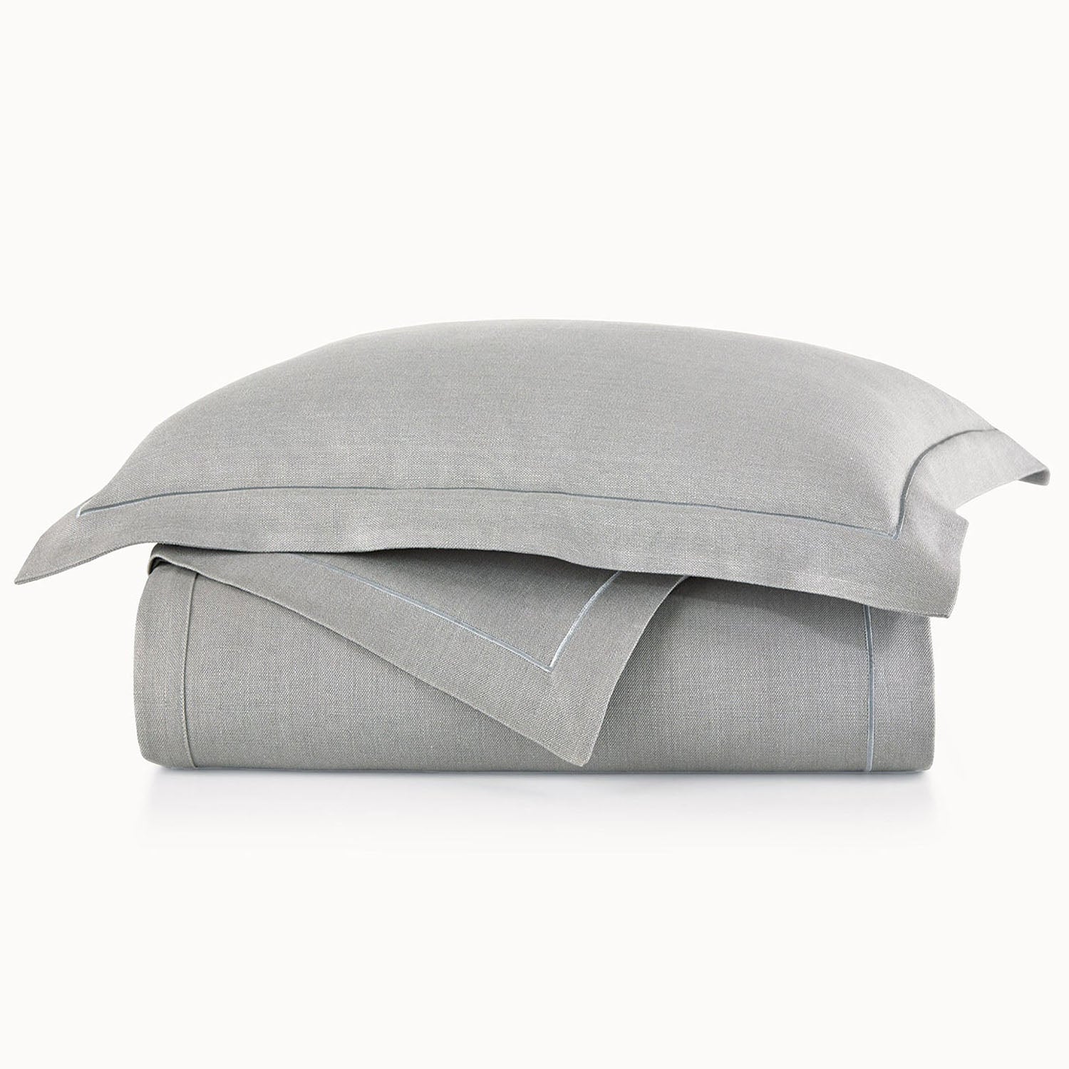 Peacock Alley Rio Flanged Linen Duvet Cover 100% linen flanged duvet cover, stack of neatly folded linens