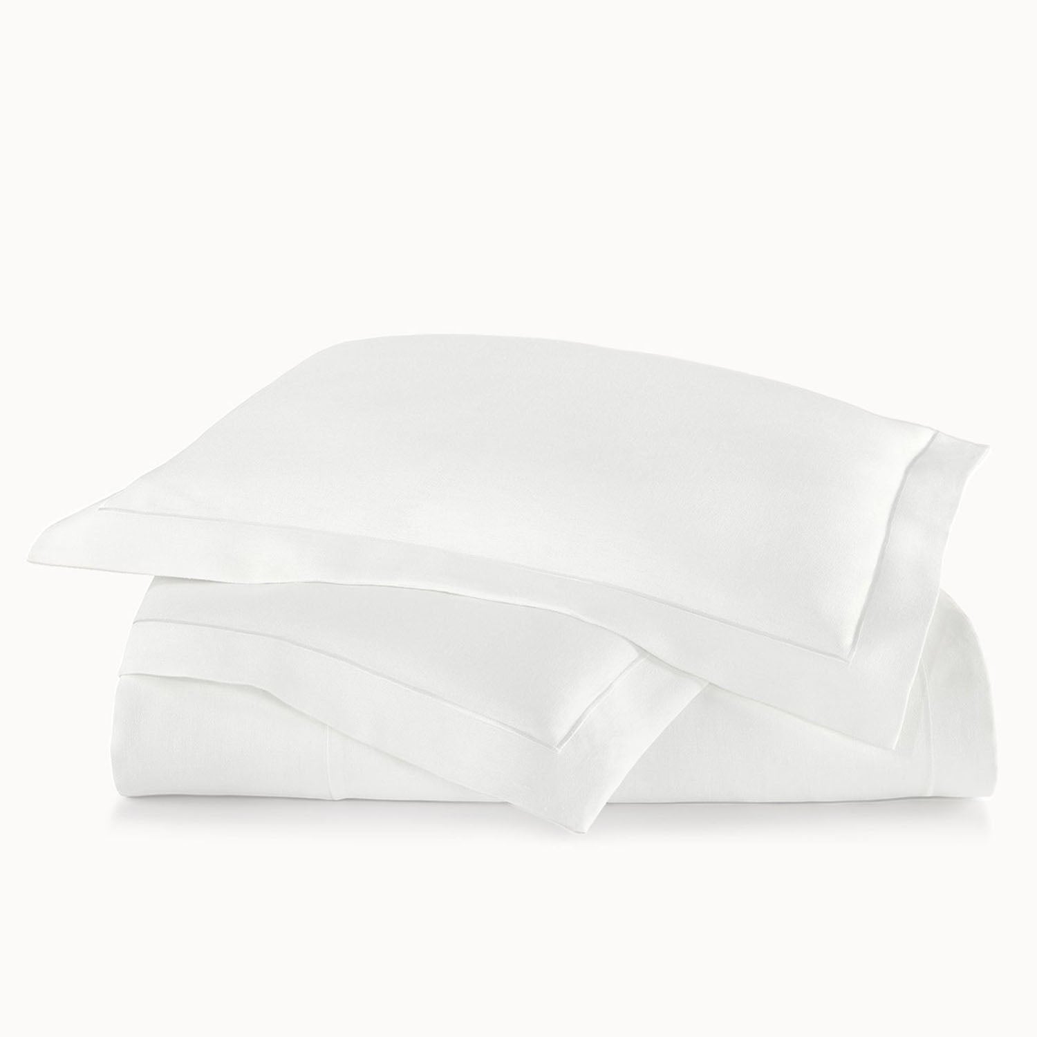 Peacock Alley Rio Flanged Linen Duvet Cover 100% linen flanged duvet cover, styled with coordinating shams and pillows