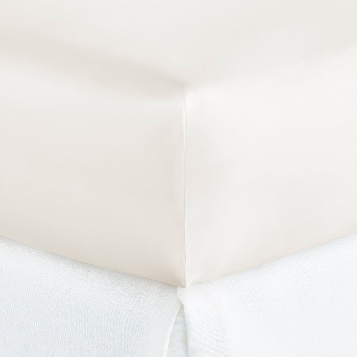 Peacock Alley Virtuoso Sateen Flat Sheet 600 thread count cotton sateen flat sheet, stack of neatly folded linens