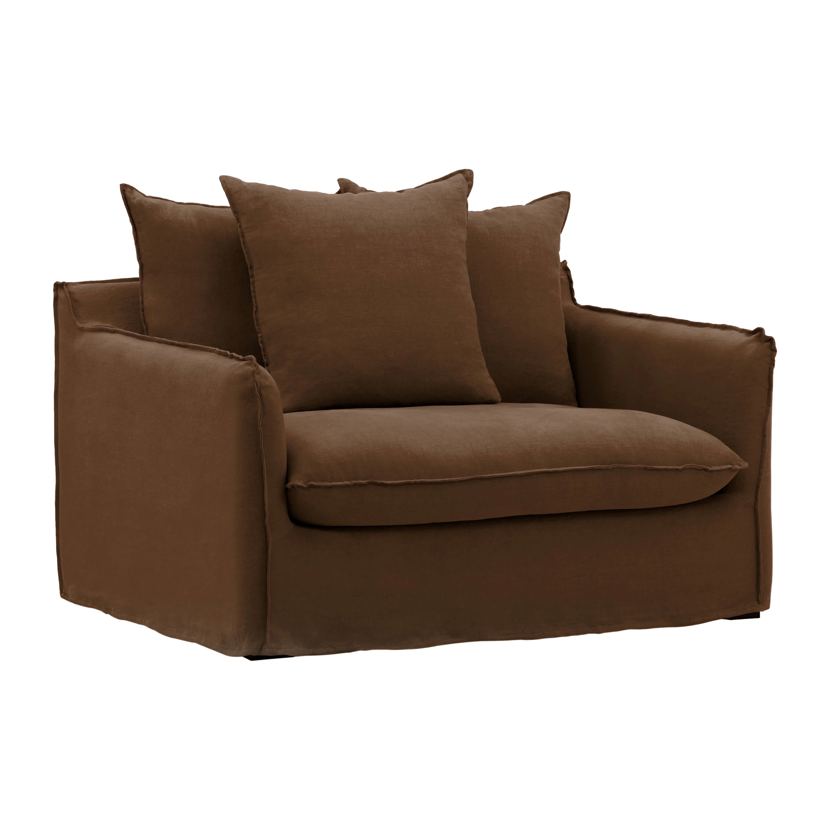 Vivian slipcover sofa chair styled with a throw pillow