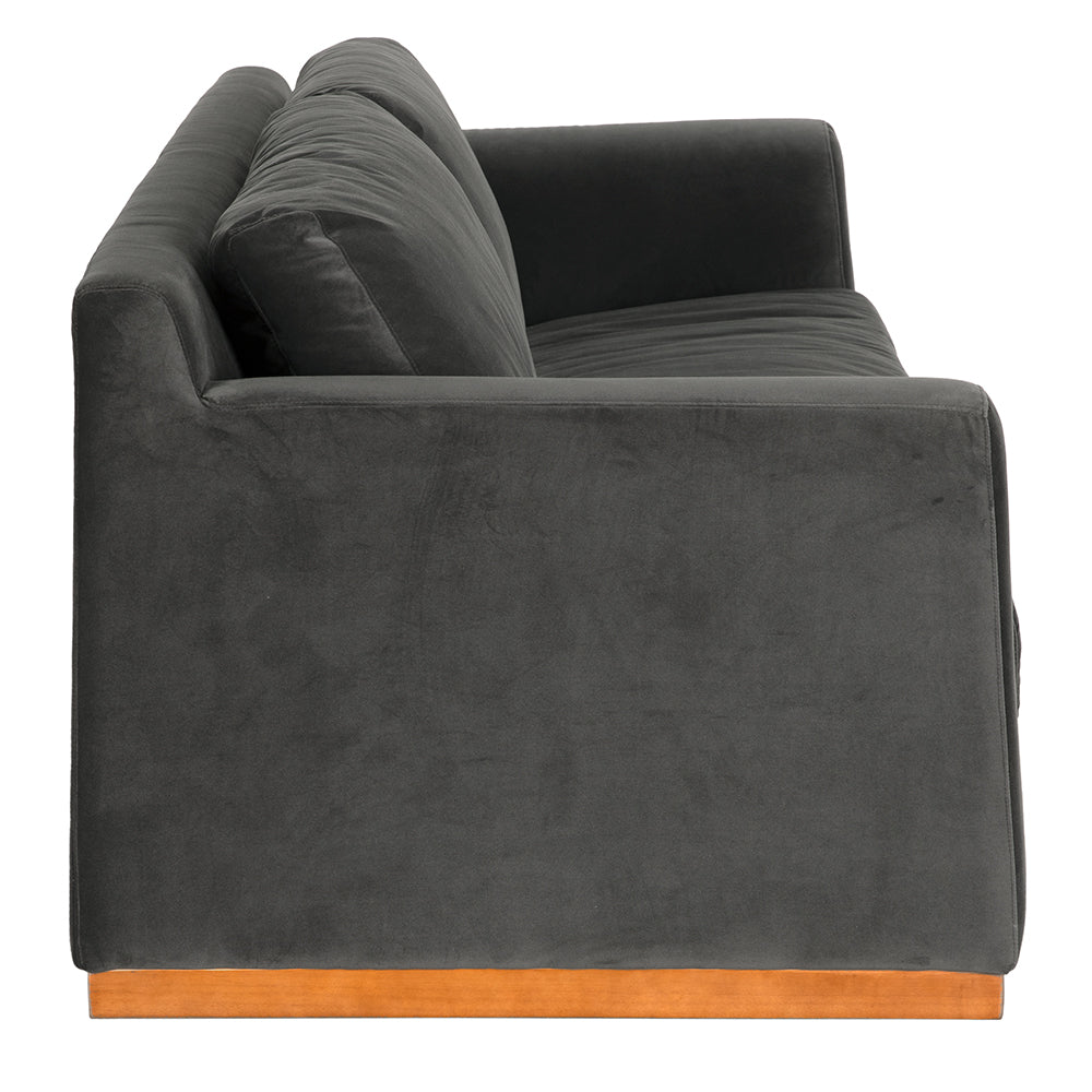 Noir Seville Grey Velvet Sofa, warm walnut plinth base