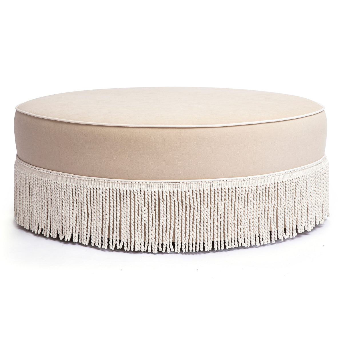 TOV Furniture Tassy Tasseled Round Ottoman in tan velvet with fringe trim, primary product view