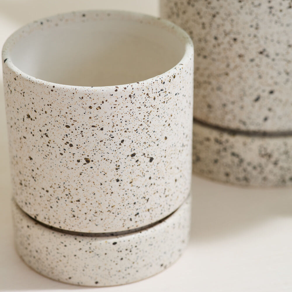 Nisha Pot detail view, off-white ceramic planter with saucer