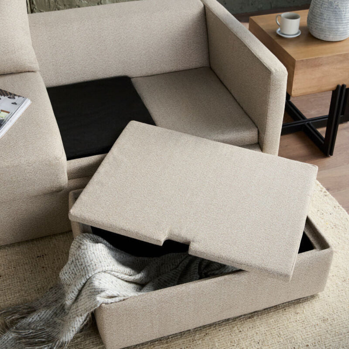 Open box revealing the interior of the sectional sofa.